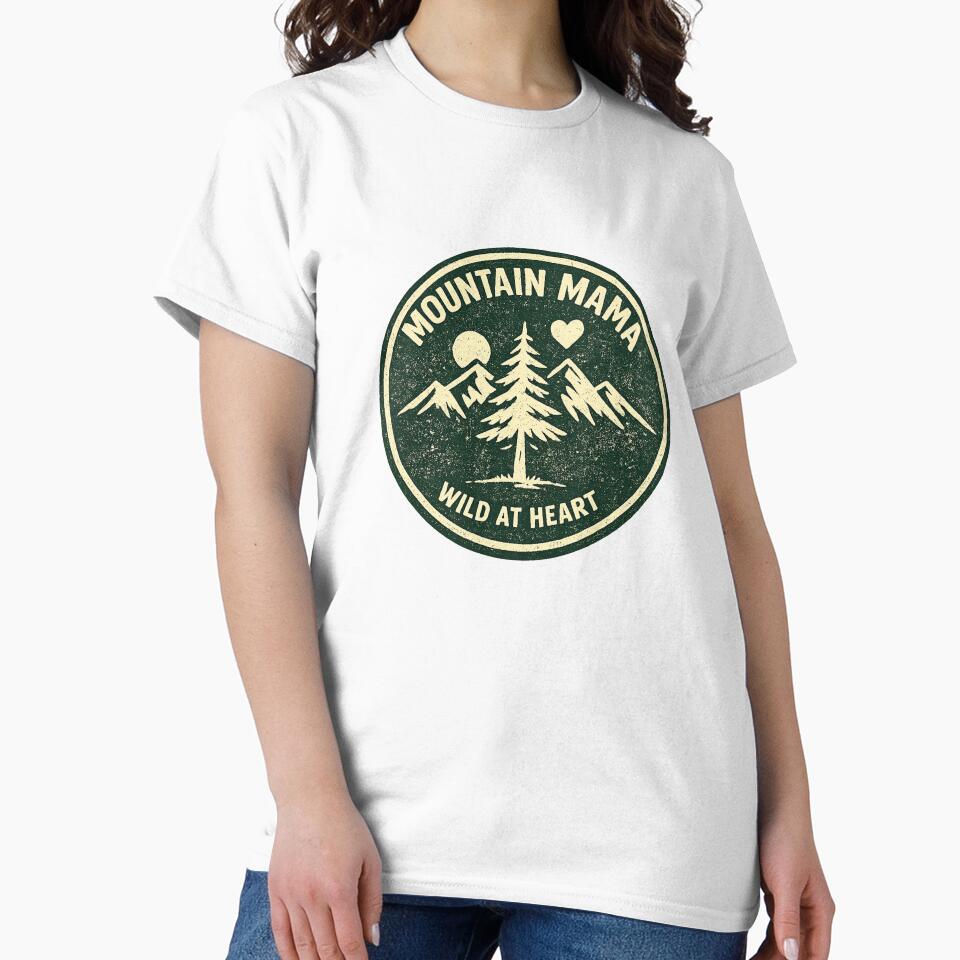 Mountain Mama — Wild At Heart (evergreen pine circle, cream mountain trio + tall pine tree + sun + heart) — outdoor mom niche by VaultInk